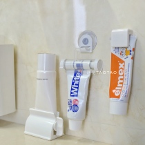 Meet TaoTao) squeeze toothpaste artifact facial cleanser clip hanging wall clip children baby toothpaste clip