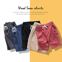Casual shorts men's summer men's loose sports white cotton outer wear pants beach pants 5 points pants trend