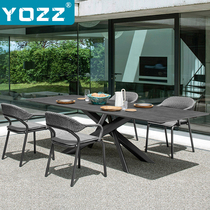 High-grade imported rock board outdoor table and chair Villa courtyard outdoor leisure dining table and chair combination indoor and outdoor household table