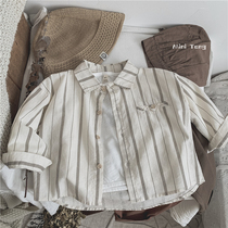 The Japanese Ins ~ Korean version of the Korean version of the Hemp Child Vertical Stripe this shirt male and female childrens temperament turns on the shirt for the spring and autumn season