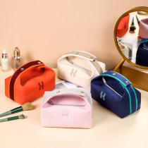 Cosmetic bag portable large capacity 2021 New Net Red advanced sense portable travel wash bag cosmetics storage bag