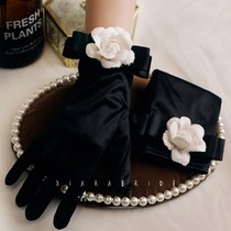 Black gloves vintage Hepburn style socialite tea flowers satin bow bridal dress accessories studio photography