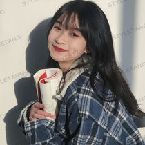 Lamb wool cotton-padded dark blue plaid lapel Korean version of loose coat female ins tide vitality girl 2021 winter