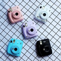 Camera small students can take photos. Polaroid students are cheap and cute.