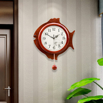 New Chinese style solid wood wall clock living room Chinese style atmospheric clock creative simple fish shape decorative mute wall hanging clock