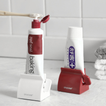  Creative net celebrity Japanese lazy man manual automatic toothpaste artifact Facial cleanser extruder Hand cream shelf