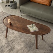 Nordic black walnut small tea table small apartment living room Oval creative furniture modern simple Japanese log coffee table