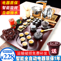 A complete set of celadon purple sand kung fu tea set home automatic electric magnet stove integrated tea tray tea platform