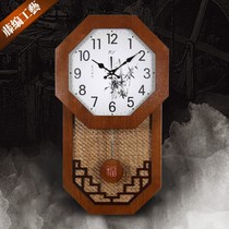 New Chinese solid wood living room wall clock Chinese style rattan quartz clock clock silent bedroom wall watch