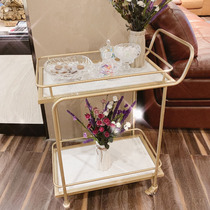 European-style golden hotel bar trolley restaurant Mobile hand push dining car creative food side of a few fruit car commercial