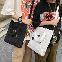 Mens bag shoulder bag Korean backpack shoulder bag mens casual female satchel bag student backpack large capacity canvas bag