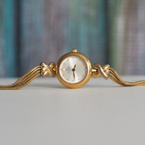 Lonely 1980s French watch antique watch gold bracelet round quartz watch niche watch female