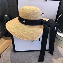 This years popular Japanese Rafi grass bee straw hat windproof sunscreen sunshade beach hat female beach vacation tide female
