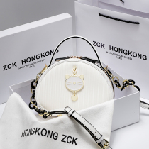 Hong Kong high-class sense of leather womens bags 2021 new fashion mini messenger bag Western style cute handbag summer
