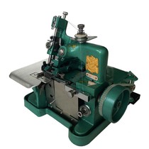 Third-tier dragonfly four-line lock edge machine home electric old sewing machine bag stitched side code edge