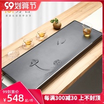 Fang house natural whole piece of black gold stone tea tray small household dry bubble simple tea table tea slate relief tea tray
