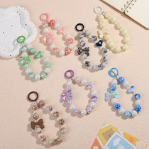New DIY mobile phone case pendant short mobile phone chain bow two-color beaded earphone bag pendant pendant