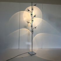 Minimalist living room floor lamp designer light luxury creative bedroom atmosphere lamp rainbow projection ins Wind lamp