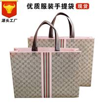 Spot Clothing Shop Handbag Bookbinding laminated non-woven hand carrying gift bag Woman Clothing handbag Dingling logos