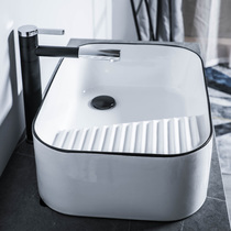 On the side of the washing basin on the stage the left and right side of the washing board is 60cm ceramic large long household one-piece washing tank.