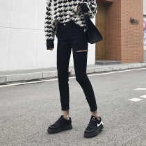 2021 Spring and Autumn New High waist hole jeans womens net red and black thin Joker Korean version of small feet pants