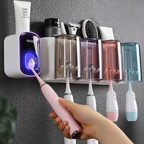 Toothbrush rack fully automatic toothpaste squeezing artifact lazy household non-perforated wall-mounted suction Wall set