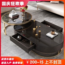 Italian light luxury rock slab tea table small apartment living room stainless steel round glass household telescopic TV cabinet combination