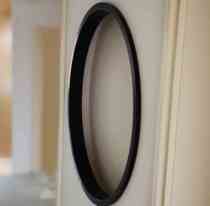 The new Chinese round solid wood window cover is customized L screen edge sealing yam sleeve line entrance background wall L-type hemming line