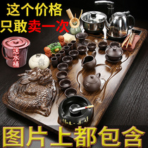 A complete set of Kung Fu tea sets household electric stove simple Purple sand ceramic teacup pot tea table solid wood tea tray