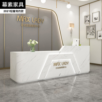 The companys front desk is simple and modern beauty salon shop counter table training institution baking paint bar counter cash register