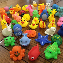 The baby played in the water the sound childrens toys the mixed batch the small yellow duck the bath toy