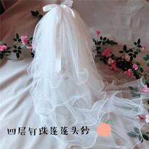 Head yarn headdress Super fairy Moren veiling Net red photo props Bride wedding pearl collar certificate big light bow