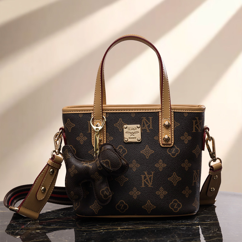 French high-end bag womens 2020 new wave one-shoulder sloping handbag ocean pie bucket bag 託 special bag