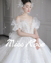 Wedding dress 2021 new bride one-shoulder luxury palace heavy industry puffy skirt long tailed Starry Sky Bow fairy