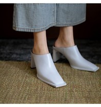 Baotou female European and American style 2021 spring and summer new simple square head thick heel temperament medium high heel leather cool half slippers