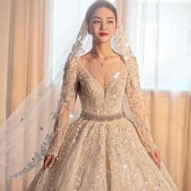 Long sleeve wedding dress 2021 new bride Hepburn Palace style big tailing luxury heavy industry advanced texture main yarn temperament