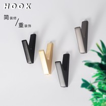 Black clothes hook single hook metal wall wall decoration adhesive hook perforated coat hook gold Nordic weighing strong