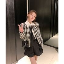 2021 temperament Sweet a glimpse of temperament black and white grid small fragrant style top thin short bow coat