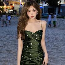 Drawstring suspender dress female 2021 summer new Korean version slim temperament pleated polka dot hot girl hip skirt