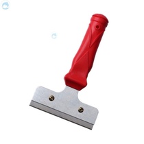 A small red handle putty knife tile decontamination scraper glass cleaning tool beautiful seam removal