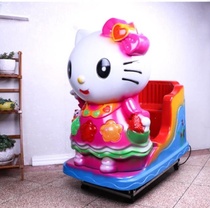 The childrens rocking machine with lights at the door of the store attracts the baby childrens toys swing car sucking