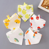 A triangular towel with five pieces of clothing.
