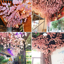 Simulation cherry blossom branch fake peach blossom branch wedding bouquet plastic fake flower indoor living room Net red ceiling decoration Flower Vine