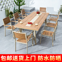 New outdoor plastic wood table and chairs Three-five-piece Courtyard Embalming Waterproof Sunscreen Combined Casual Outdoor Open-air Garden