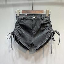 European station 2021 summer new personality drawstring strap denim shorts Women foreign style age slim wide feet hot pants