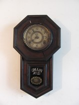 100-year-old antique clock Trumpet Gossip fish tail wall clock