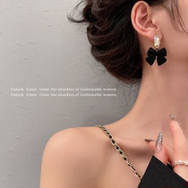 Korean black bow earrings womens summer exaggeration 2021 new trend high-end sense light luxury exquisite nail fairy