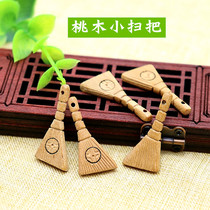 Wild peach wood carving Feicheng childrens jewelry baby accessories material woven Keychain Car pendant small broom