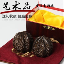 Old mans hand pan walnut hand hold gym ball holding a pair of middle aged hands ball hand movement hand turned ball solid wood