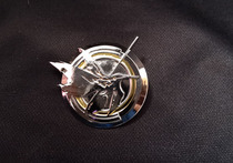 The collapse of the 3rd around the world the Earth Medal the fire of the moth emblem the metal badge the brooch